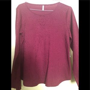 Woman’s top. Long sleeve, round neck. Deep wine color. Size 14-16.